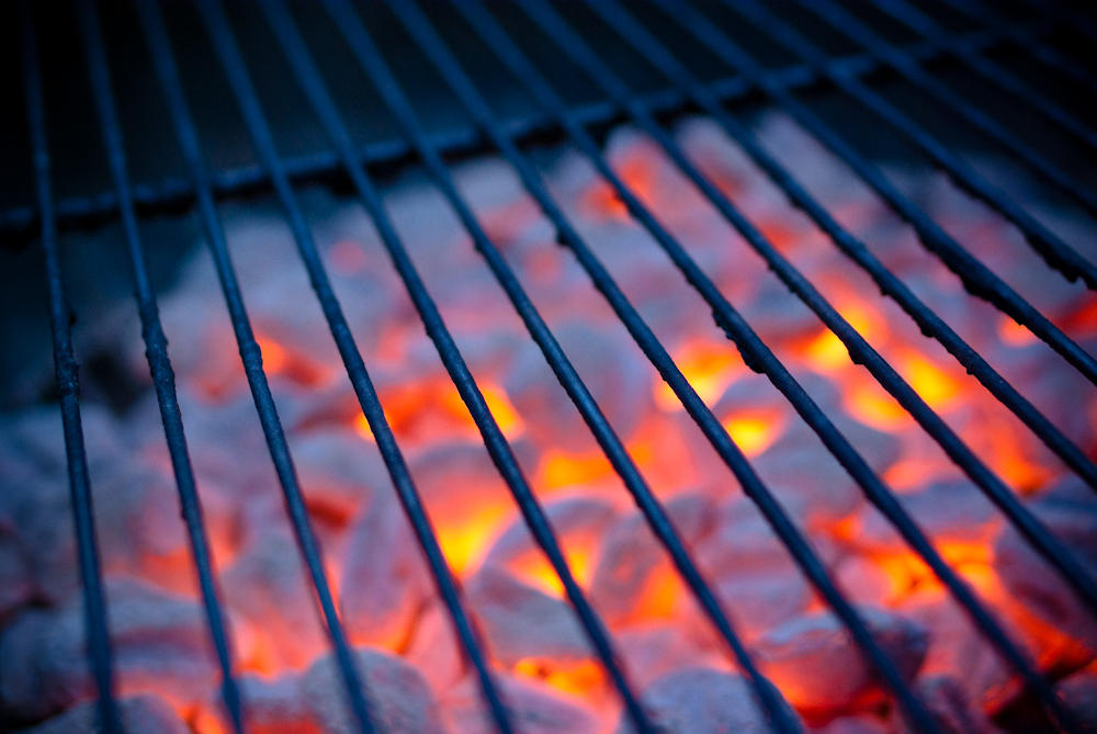 Grill and glowing charcoal waitinf for food to grill