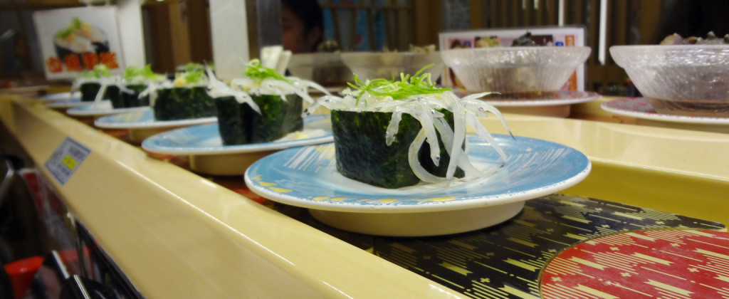 Baby herring sushi on the conveyor belt