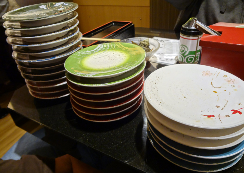 Conveyor belt sushi: 25 plates between 3 people