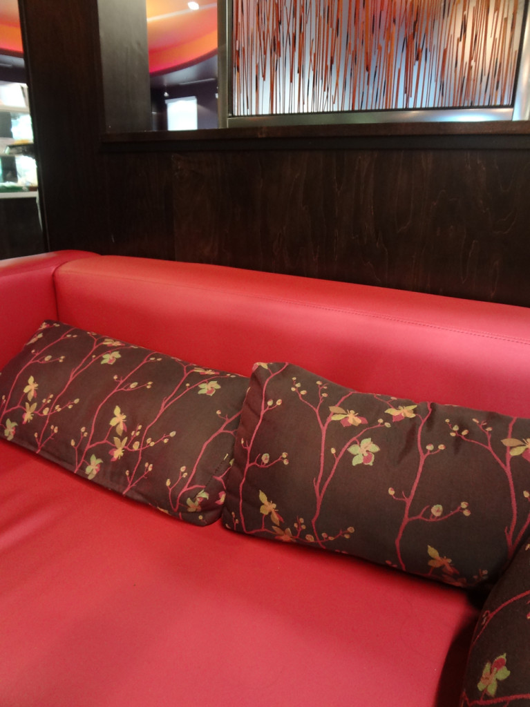 Couch in lounge area at Sweet Hut