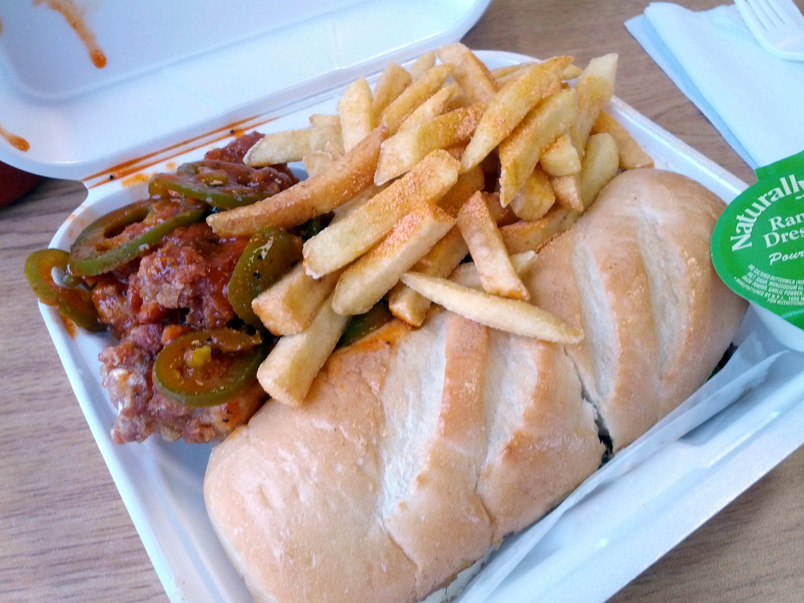 Philly cheesesteak, mexican hot wings, and fries