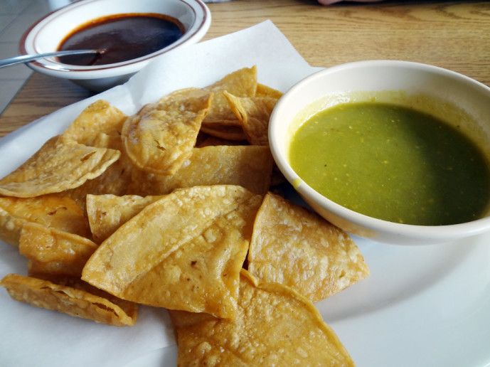 Handmade tortilla chips with two types of sauces