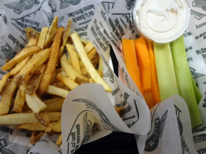 Wing Stop seasoned fries, and veggie sticks with dip