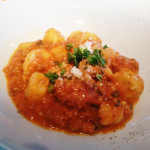 Hand-rolled potato gnocchi with bolognese, braised veal, beef, pork, and tomato sauce.