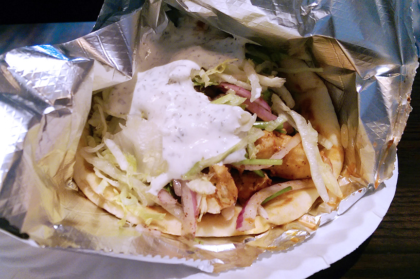 Chicken Gyro - Thinly sliced spit roasted marinated chicken