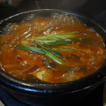 Boiling kimchi soup at Cho Sun Ok