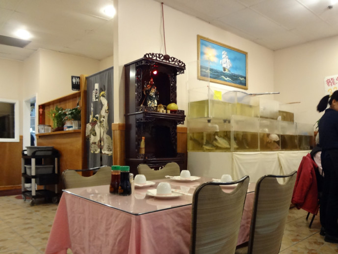 Golden BBQ altar and live fish